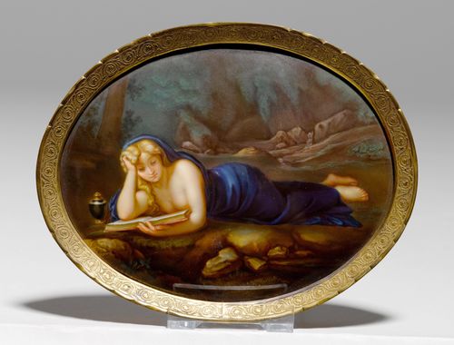SMALL OVAL PORCELAIN PAINTING OF "MAGDALENA" AFTER CORREGGIO,Meissen, ca. 1880. Woman covered with a blue fabric, reading a book. Underglaze blue sword mark with pommels, model number A. 147 incised, press number. 14.5x11.5 cm. In a metal frame.