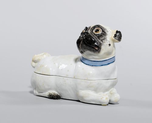 BOX DESIGNED AS A PUG,Meissen, 20th century. Designed as a reclining pug, the head turned to the side. Underglaze blue sword mark, model number impressed 78853, additional press number. L 17 cm, H 12 cm. (2)