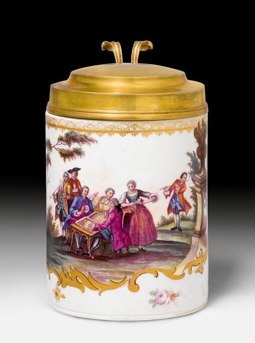 PORCELAIN PITCHER, Meissen, 19th century. Metal mount. Painted with a genre scene dated '1784', depicting elegant figures at play and making music. Sword mark on the unglazed bottom. H 16 cm including thumb rest.