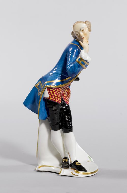 OTTAVIO,Nymphenburg, Franz Anton Bustelli, moulding from the 20th century. Bowing, the right hand in front of his mouth. Wearing a blue jacket with a lozenge-patterned vest and black knickerbockers. Impressed shield mark, model number 55/28. H 19 cm.