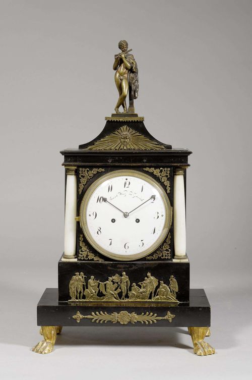 MANTEL CLOCK, Biedermeier, the dial inscribed JACOB WIRZ IN ZÜRICH. Ebony and alabaster. Rectangular case on carved claw feet. Brass applications designed as leaves and a mythological frieze. White enamel dial. Anchor escapement striking the 1/2-hour on gong. H 54 cm. Serviced.