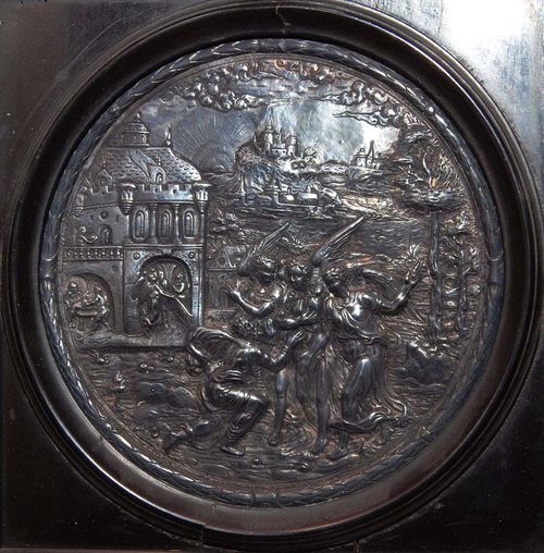 ABRAHAM AND THE THREE ANGELS,South German, dated 1590. Embossed silver. D 14.8 cm. In a later ebonised wood frame. 23.5x23.5 cm.