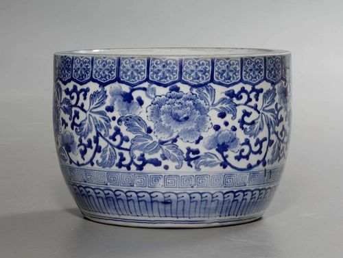 TWO UNDERGLAZE BLUE HIBACHI AS JARDINIÈRES WITH FLORAL DECORATION. Japan, Meiji Period, Heights 27 and 31 cm. (2)