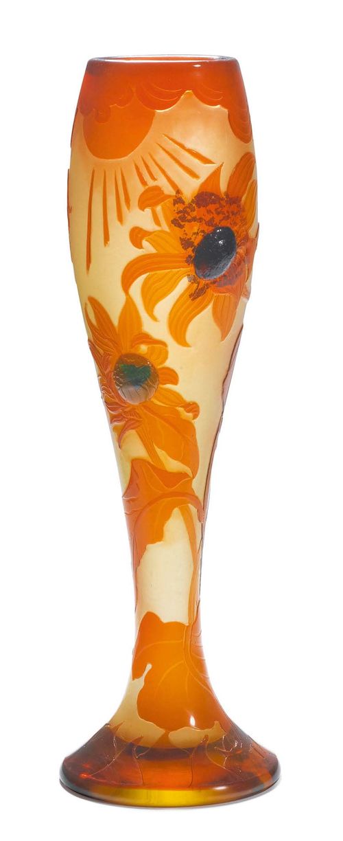 EMILE GALLE, VASE, circa 1900. White glass overlaid in orange, with applied and etched decoration. The bottom signed: Gallé déposé. H 34 cm.