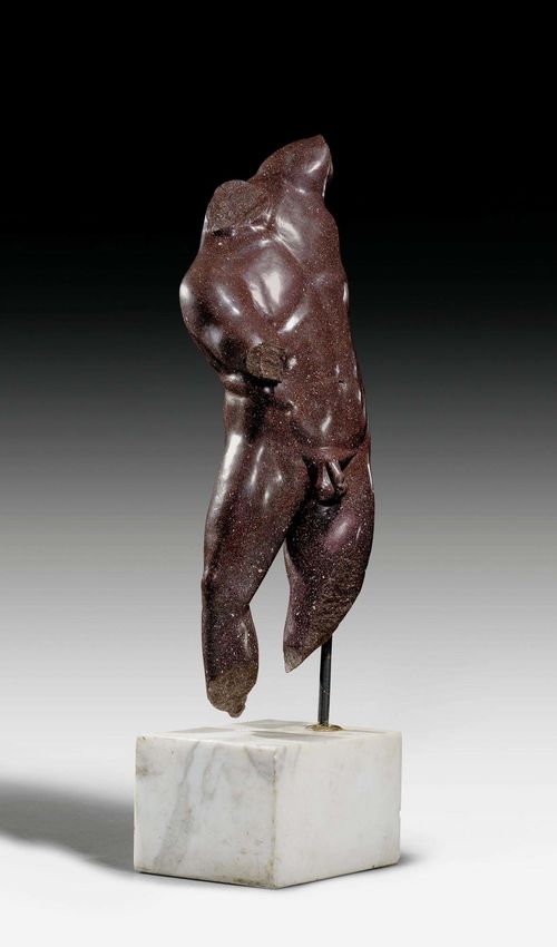 PORPHYRY TORSO OF A YOUNG ATHLETE, after designs from the 5th century BC, Rome. Mounted on an iron rod with a rectangular white marble plinth. H 90 cm.