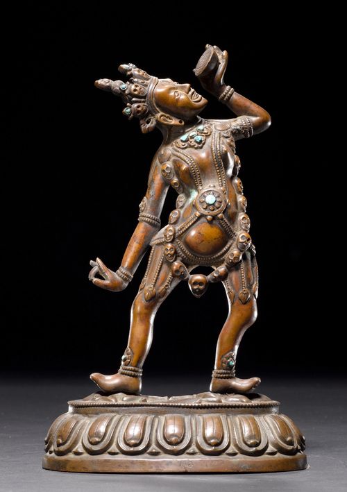 A COPPER FIGURE OF A STANDING DAKINI WITH TURQUOISE INLAYS. Tibet, 20th c. Height 24 cm.