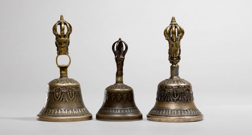 THREE GHANTAS OF BELL METAL AND BRONZE. Tibet, antique, 14.5-18.5 cm. (3)
