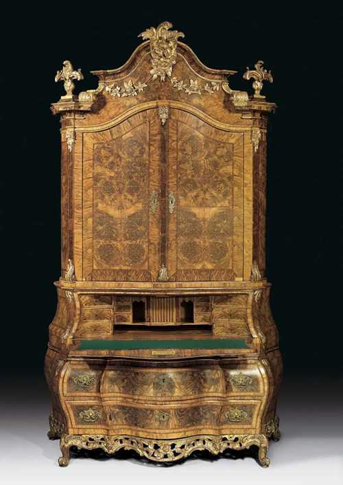 IMPORTANT BUREAU CABINET, Late Baroque, circle of KÖSTER workshop (founded 1750  by Johann Köster, later run by his sons), Altona circa 1760/70. Walnut, burlwood and local fruitwoods in veneer also with exceptionally rich carving. Hinged top lined inside with green felt, over richly shaped front with 2 drawers, fitted interior with central compartment with slatted front between small compartment under drawer and 6 further drawers. The architectural style superstructure with shaped double door and 3 pilasters. The marquetry heavily warped. Restored. 145x76x(open 96)x276 cm. Provenance: Private collection, Frankfurt.