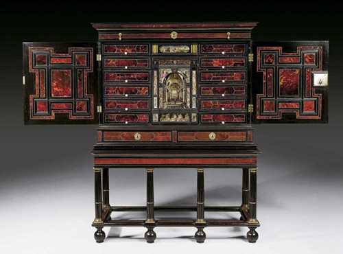 CABINET ON STAND, THE "VYNER CABINET", Baroque, Netherlands circa 1650. Ebony and red tortoiseshell and ivory finely inlaid with reserves, fillets and frieze. The architectural style cabinet with exceptionally fine behind glass painting in the style of Dirck van Delen (Heusden 1605-1671 Anemuyden) with interior scenes and depiction of Veritas and Concordia. Drawer with narrow frieze after an engraving by S. di Bella (1610 Florence 1664) ca. 1640. The interior with central compartment and behind glass painting framed by 18 small drawers. Ivory knobs and gilt bronze mounts. 132x54x167 cm. Provenance: - by descent, a gift from King Charles II to Sir Robert Vyner, London. - Christie's London in the 1980s. - from an important private collection, Switzerland.