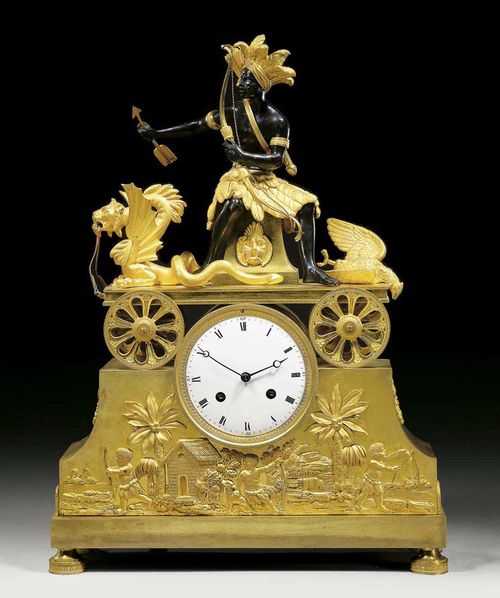 MANTEL CLOCK "LE CHASSEUR AMERINDIEN", Directoire, the model probably by J.S. DEVERBERIE (Jean-Simon Deverberie, died 1824), Paris circa 1795/1800. Matte and polished gilt bronze and burnished bronze. With figure of hunter with bow and arrow and his catch. The clock with enamel dial and verge escapement striking the 1/2 hours on bell. Exceptionally fine bronze applications in the form of children playing. 30x11x51 cm. Provenance: Private collection, Belgium. Only three identical models are known: one is in the Duesberg collection  in Mons, a further one in Musée du Nouveau Monde in La Rochelle, and the third in the collection of P. Izarn in Paris.
