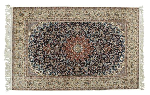 ISFAHAN old. Blue central field with red central medallion, finely decorated with trailing flowers and palmettes, beige border. Good condition.336x211 cm.