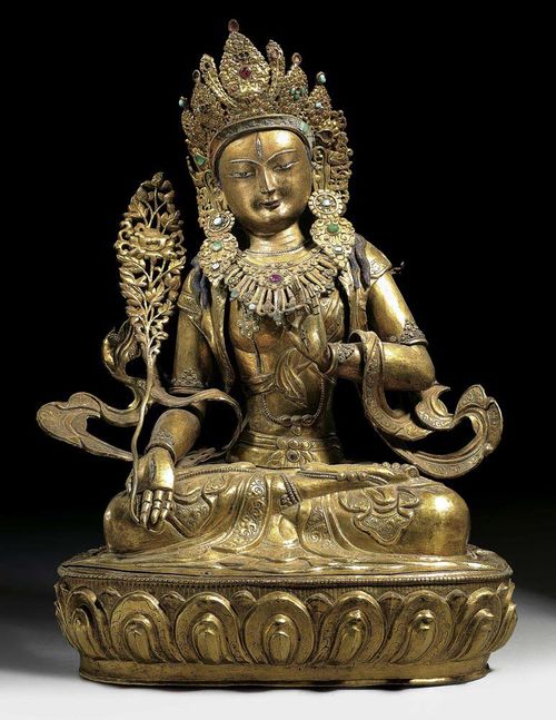 LARGE FIGURE OF WHITE TARA in repoussé technique and gilded. The hair and face painted. The finely chased crown set with turquoises. Mongolei, 18th century. H 45 cm. Some stones lost.
