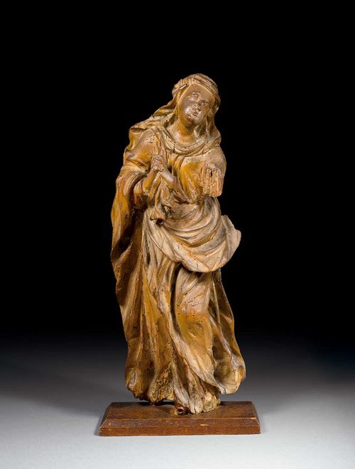 MARY AT PRAYER (from a Crucifixion group),Baroque, from the area around Lake Constance, ca. 1700. Lime, carved, verso flattened and with traces of paint. Mary standing and praying. H 54 cm. Part of the left arm missing.