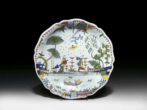 CHINOISERIE DECORATED BOWL, Rouen, Guillibaud, circa 1740. Painted with figural chinoiserie scene in green, yellow, blue and iron red. Blue mark for Guillibaud. D 24.5cm. Provenance: private collection, South Germany