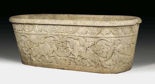 MARBLE BATH, probably Roman, the relief probably 17th century "Carrara"-marble. The front with exceptionally fine relief of lion flanked by bowl of fruit, flowers, leaves, cartouches and frieze. 175x70x61 cm. Provenance: Private collection, Switzerland.