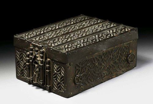 CASKET OF THE "MESSEBUCHKASTCHEN" TYPE, Renaissance, probably France or Spain, 15/16th century Finely pierced iron plaques on wood, with double lock. With 2 rings to the sides, lined inside in red leather. 27x19x12 cm. Provenance: Private collection, Basel.