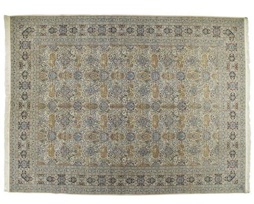 NAIN. Beige ground patterned with flowers and animals in cartouches, light border. Good condition. 410 x 310 cm.