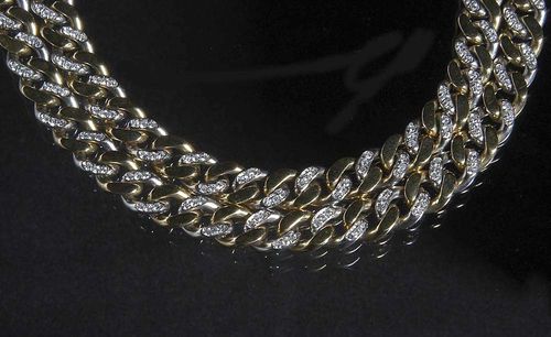 DIAMOND AND GOLD SAUTOIR, BULGARI. White and yellow gold 750. The white gold links decorated with numerous small diamonds totalling ca. 8.00 ct. L ca. 90 cm. En suite to following lots.