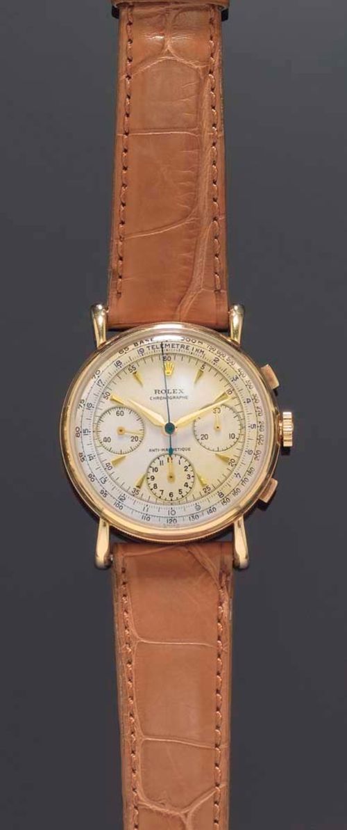 GOLD GENTLEMAN'S WRISTWATCH, CHRONOGRAPH, ROLEX, 1955. Yellow gold. Gold case no. 130784, domed base, glass and lugs slightly vaulted, silvered dial, gold numerals, 3 chronographs, tachometer, signed Rolex Chronograph anti-magnetique, Ref. 9162, anchor escapement, Cal 72A, brown leather strap. In very good condition.