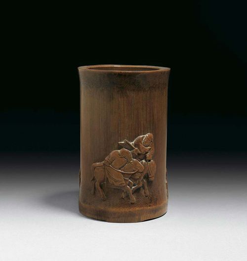BAMBOO BRUSH HOLDER with relief design of two riders. Signed: Jiang Chunbo ke. China, Qing Dynasty, H 15 cm. Slightly restored fissures.