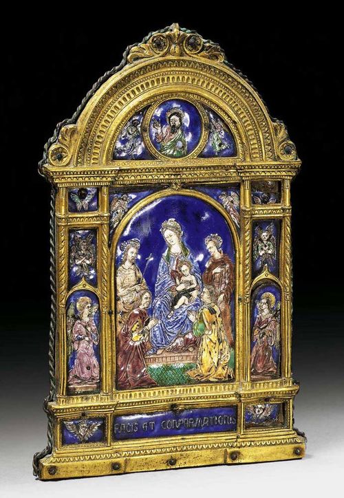 SMALL HOUSE ALTAR WITH ENAMEL PLAQUES,Late Renaissance, probably Limoges, 19th century Depicting the Virgin Mary and Child, 4 Evangelists and Saints. In fine gilt brass frame. H 22 cm, W 14 cm. Provenance: Private collection, Basel