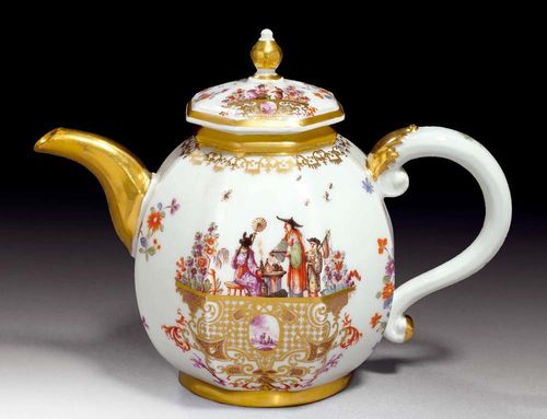 TEAPOT WITH LID, Meissen, circa 1730-35.Octagonal form with looped handle and applied gilt leaf and gilt polygon spout, painted with Chinoiserie decoration in the style of J.G. Höroldt: a Chinese family preparing tea depicted on each side of the teapot. The richly gilt plinth with Bottger lustre and landscape reserves in Purpur Camaïeu, and foliate work in iron red and purple. The sides with Kakiemon style Indianische Blumen. The lid similarly decorated. Underglaze blue sword mark, potter's mark. H 14cm. The gilding on spout and edge of the lid retouched.