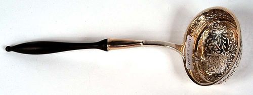 SUGAR CASTER SPOON. Bern, circa 1830. Maker's mark Rehfues & Co. Wooden handle. L 20 cm, 30 g.