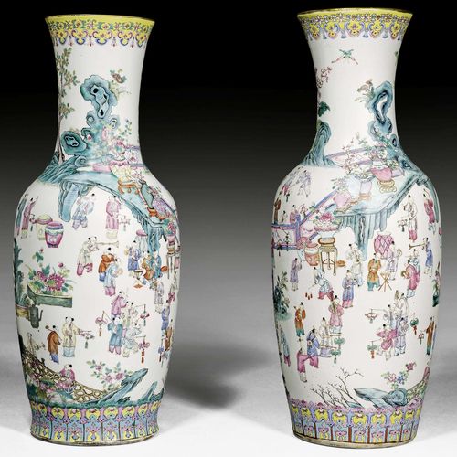 A PAIR OF LARGE FAMILLE ROSE VASES DECORATED WITH CHILDREN PLAYING IN A GARDEN. China, 19th c. Height 60.5 and 62 cm.