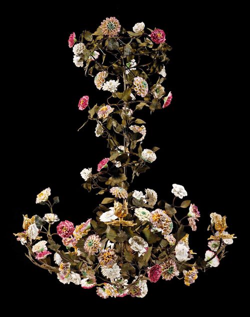CHANDELIER WITH PORCELAIN FLOWERS,Louis XV, the flowers from the Manufacture de Vincennes, France, 18th century. "Tole peinte", gilt bronze and finely painted porcelain. With 6 branches. D 66 cm, H 105 cm.