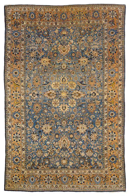 KESHAN antique. The blue central field is patterned with trailing flowers and palmettes in beige and black, with a beige border. Some wear, 220x345 cm.
