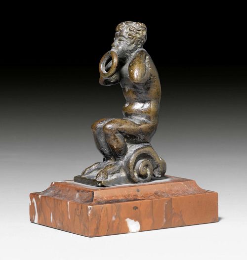 SMALL BRONZE FIGURE OF A FAUN,Renaissance, probably Florence circa 1600. Burnished bronze and "Griotte Rouge" marble. Probably formerly a mount or handle. 5.5x7.5x10 cm.