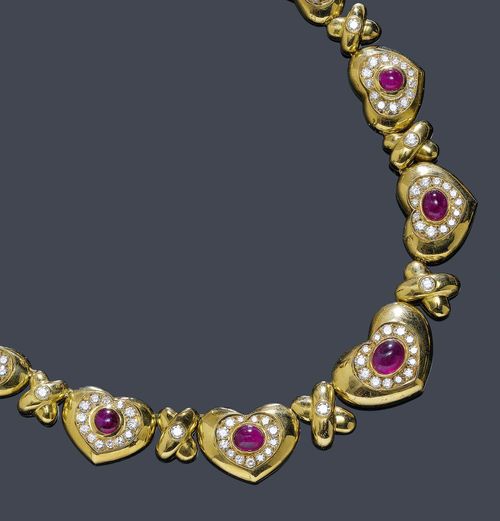 A RUBY, DIAMOND AND GOLD NECKLACE, BRIGOLA. Yellow gold 750, 92g. Set with 7 ruby cabochons of a total of ca. 8.00 ct, and in total ca. 105 brilliant-cut diamonds of ca. 5.00 ct. L ca. 42 cm.