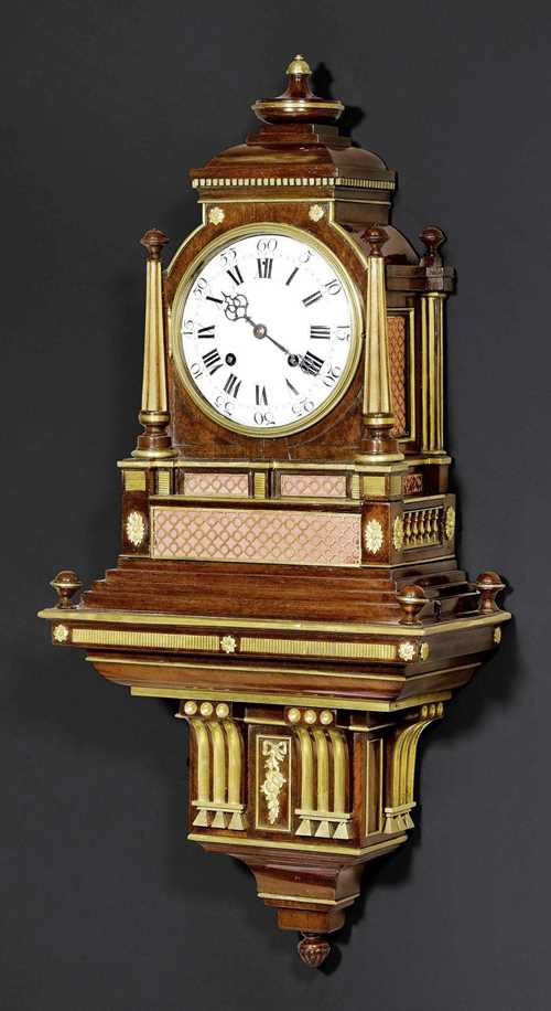 CLOCK WITH ORGAN and plinth,Louis XVI, the case attributed to D. ROENTGEN (David Roentgen, maitre 1780), the movement signed PETER SCHMITT A MAINZ (Peter Schmitt, court clockmaker, according to traditional sources from 1784), German circa 1785/90. Flame mahogany with exceptionally fine brass fluting. Enamel dial, fine anchor escapement with rack striking mechanism and hour striking on bell, the barrel and 18 wooden pipes and 7 melodies triggered on the hour. Exceptionally fine, matte and polished bronze and brass mounts. 40x24x89 cm.