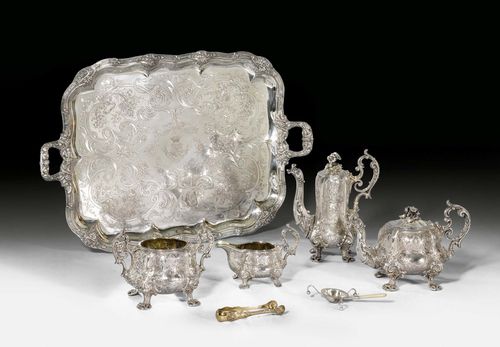 TRAVEL COFFEE AND TEA SERVICE IN CASKET. Paris, 1840. Maker's mark: Charles Nicolas Odiot. Comprising: teapot, coffee pot, cream jug, sugar bowl, tea strainer with mother of pearl handle, sugar tongs and tray. H pot 26.5 cm. Total weight: 7630 g. With engraved coat of arms of the de Clermont-Tonnerre noble family.