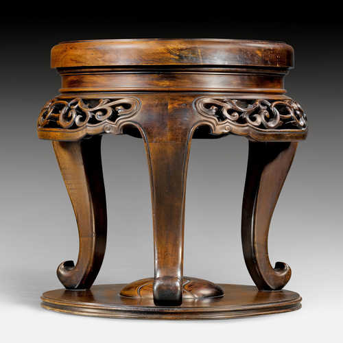 A LARGE OPENWORK HARDWOOD STAND FOR A CENSER.