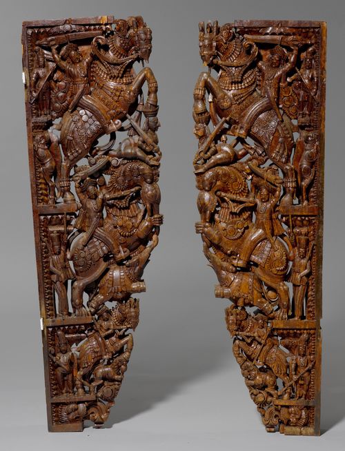 A PAIR OF COLONIAL-STYLE SOLID LACQUERED WOODCARVINGS WITH RIDERS AND ELEPHANTS.