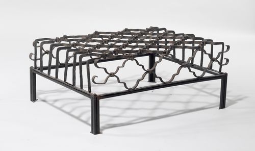 MODERN SALON TABLE CONSTRUCTED FROM AN OLD WINDOW GRILL,