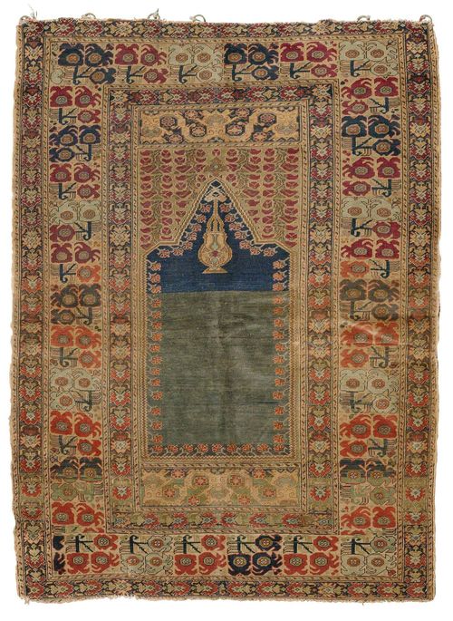 GHIORDES antique.Greenish blue mihrab with light green spandrels, wide border with stylised flowers, strong signs of wear, 127x178 cm.