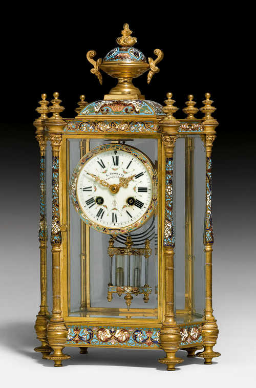 A HEXAGONAL TURQUOISE-GROUND CHAMPLEVÉ ENAMEL AND GILT MANTLE CLOCK.