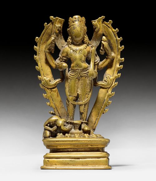 A COPPER ALLOY FIGURE OF SURYA.