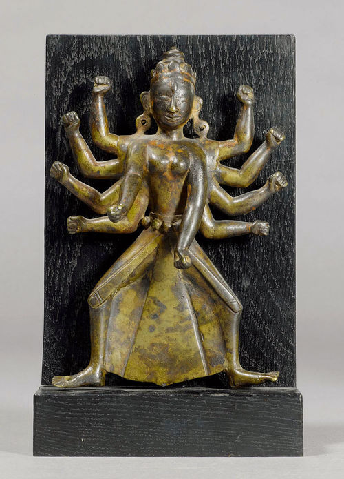 A BRONZE FIGURE OF TEN-ARMED DURGA IN A WRATHFUL POSE.