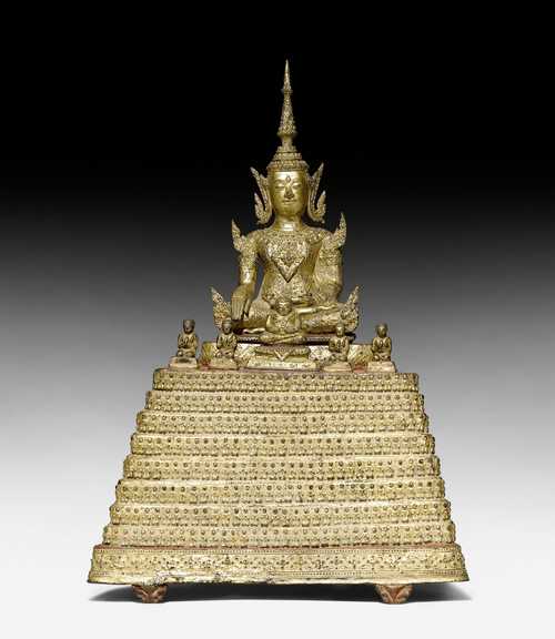 A GOLD- AND RED-LACQUERED BRONZE BUDDHA ON A HIGH PEDESTAL WITH DEVOTEES AND ROUND-BELLIED BUDDHA OF GOOD FORTUNE.