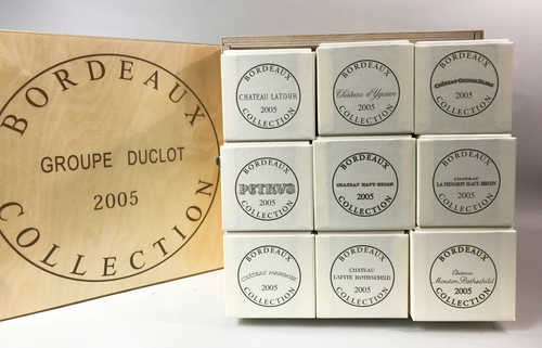 9 bts Coffret Collection Groupe Duclot (Ch. Latour; Ch. Mouton Rothschild; Ch. Lafite Rothschild; Ch. Margaux; Ch. Haut Brion; Ch. Mission Haut-Brion; Ch. Cheval Blanc; Petrus; Ch. d'Yquem) 0.75 L 2005