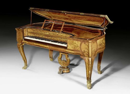 BABY GRAND PIANO,Louis XV style, signed ERARD FACTEUR DE FORTE-PIANOS ET HARPES DU ROI (Pierre Erard, 1796-1855), numbered 16450, the case from a Paris master workshop, circa 1845. Tulipwood and rosewood exceptionally richly inlaid in "bois de bout". The top edged in bronze. Ivory and ebony keyboard covering "C-g". Exceptionally rich, matte and polished gilt bronze mounts and sabots. With old wax seal. Requires servicing. 180x80x88 cm.