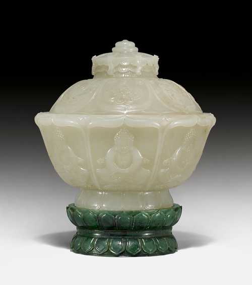 A FINE BOWL AND COVER CARVED WITH BUDDHIST SYMBOLS.