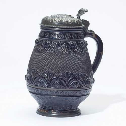 STONEWARE PEAR-SHAPED TANKARD WITH PEWTER MOUNT,