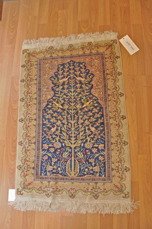 HEREKE SILK. Blue mihrab with pink spandrels, patterned with a tree of life and birds, good condition, 60x90 cm.