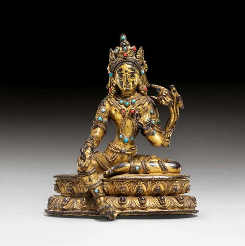 A GILT COPPER FIGURE OF THE GREEN TARA. Tibet, 15th c. Height 12 cm. Consecration plate replaced.