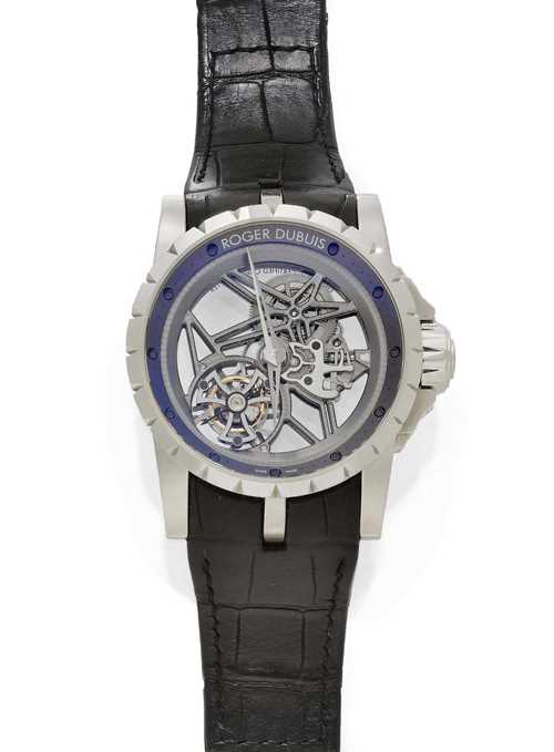 GENTLEMAN'S WRISTWATCH, ROGER DUBUIS, FLYING TOURBILLON, SKELETON WATCH. White gold 750. Excalibur model, Ref. EX45-505SQ-20-00-0E000/B, limited series, No. 58/88. Matte-finished case No. 88760 G548FA skeletted. Crown with shoulder protection and foldable protective cover. Anthracite-coloured hour ring with black screw indices, minute division in red, silver-coloured matte/polished hands, flying tourbillon at 7.30h, cage designed as a Celtic cross, movement No. 393, grey-rhodinized. Hand winder, power reserve 60 hours, tourbillon, Cal. RD 505SQ. Black leather band with fold-over clasp. D 48 mm. With box, instructions, book and valid warranty, June 2011.