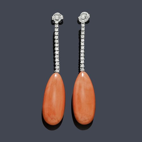 CORAL AND DIAMOND EAR PENDANTS. White gold 585. Classic-elegant ear pendants, each of 1 salmon pink coral drop weighing ca. 52 ct, mounted below a flexible line of 15 brilliant-cut diamonds weighing ca. 0.47 ct. L ca. 6 cm.